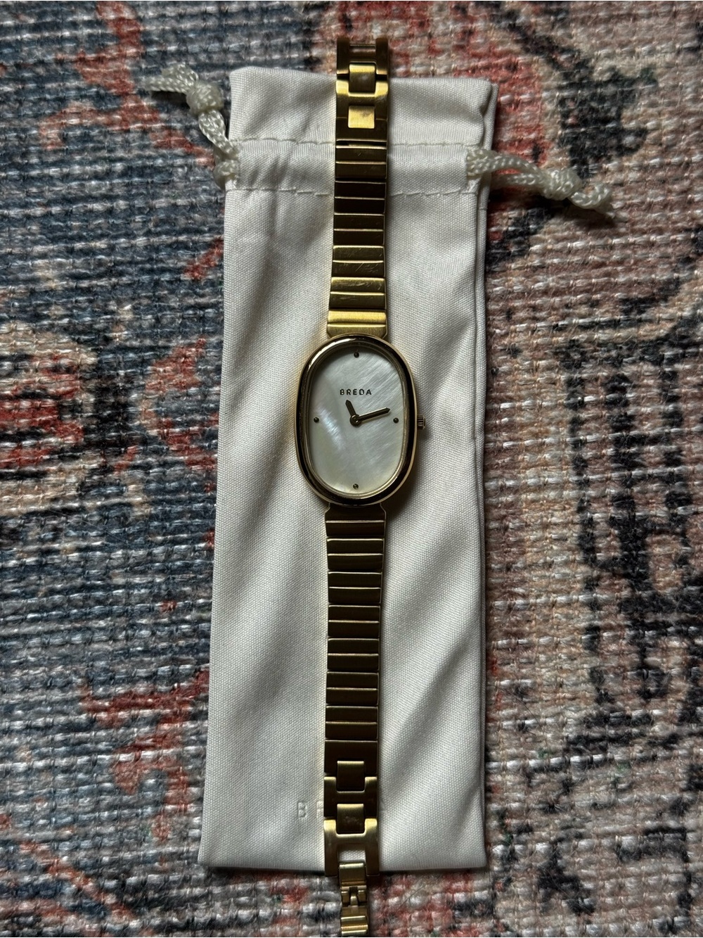 Breda Gold Oval Face Bracelet Watch with Mother of Pearl Dial